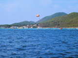 Parasailing and many tourist transport boats...